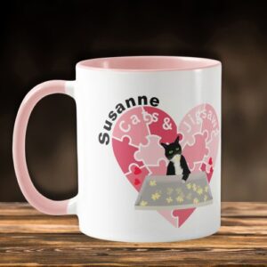 mug with a cat dping a jigsaw, in a heart