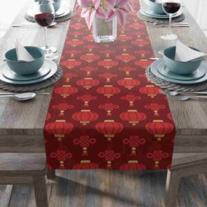 a table runner full of red lanterns to celebrate chinese new year