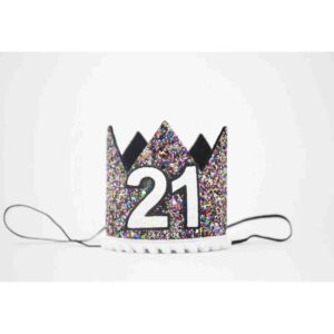 A glittery crown that has the number 21 on it.