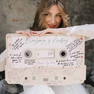 large cardboard sign in the shape of a cassette tape