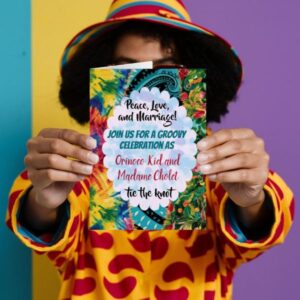 A groovy person holding up a wedding invite, tie dye effect background.