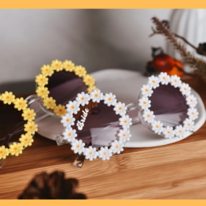 sunglasses with tiny flowers around frames