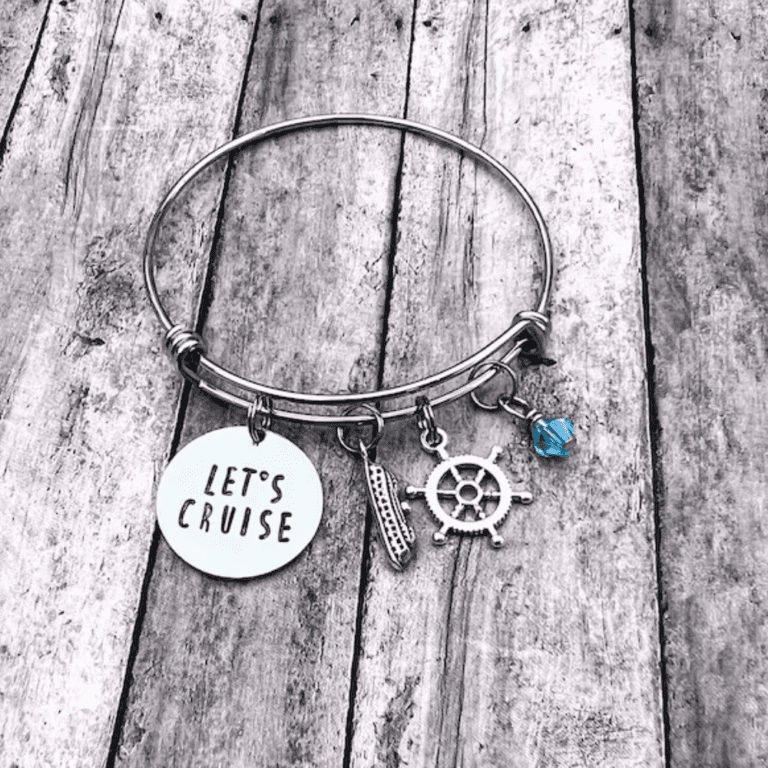 A charm bracelet with cruise themed charms