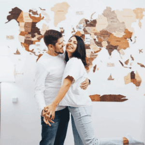 Wooden world map with pins