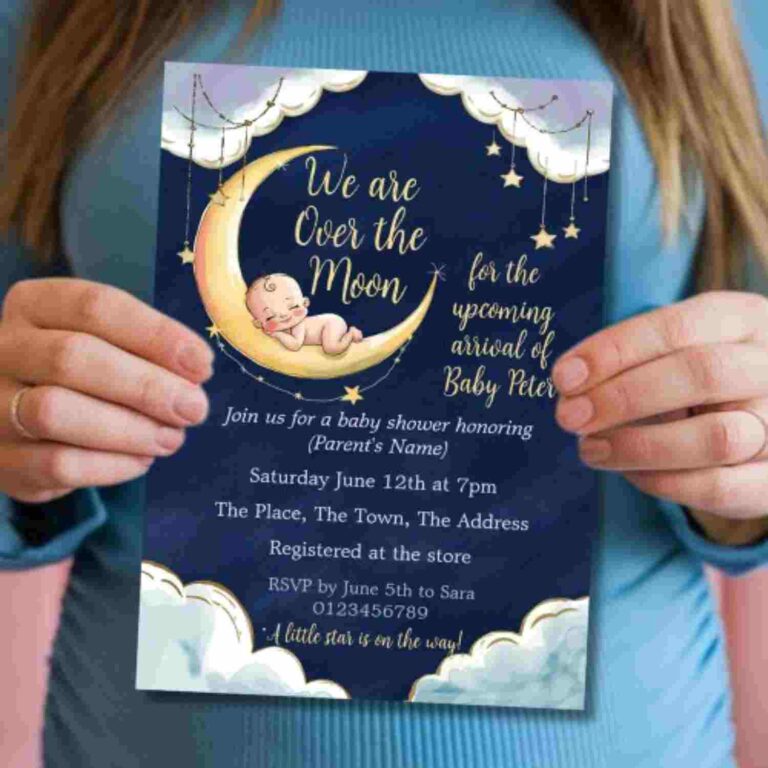 An invitation for an Over the moon baby shower with the image of a baby asleep within a moon